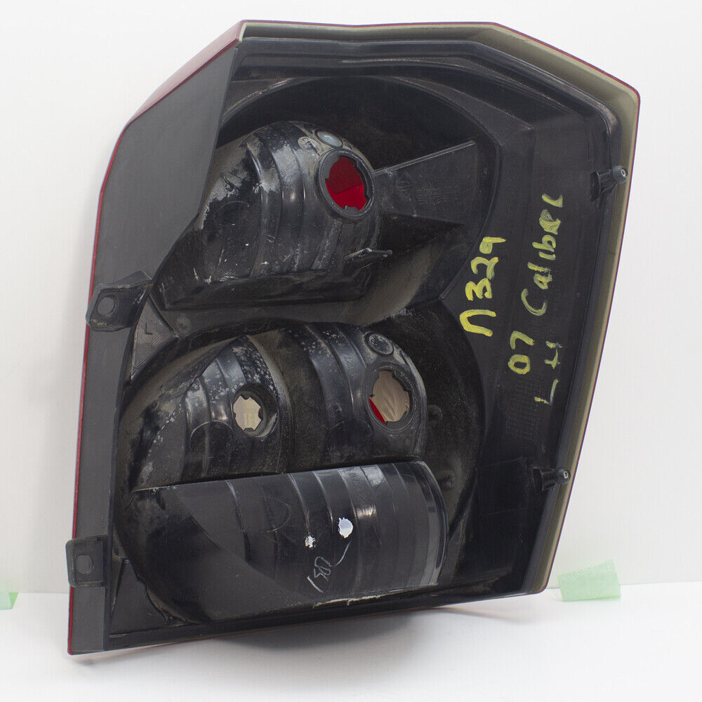 2007 Dodge Caliber Left Driver Side Tail Light Lamp Outer 5303753AG - Used OEM
